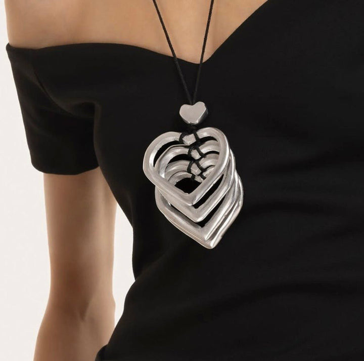 PENDENTIF 4 COEURS A TROU AL04273Zoé Del Mar